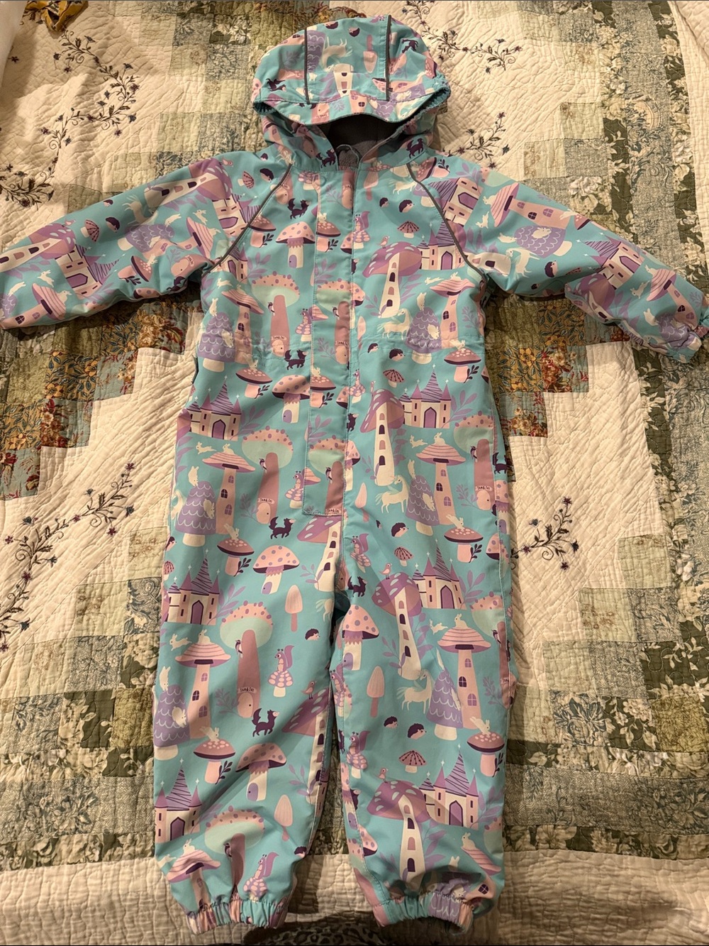 Jan and Jul Kids Waterproof One-Piece dry suit in Mint with Purple Castle Print